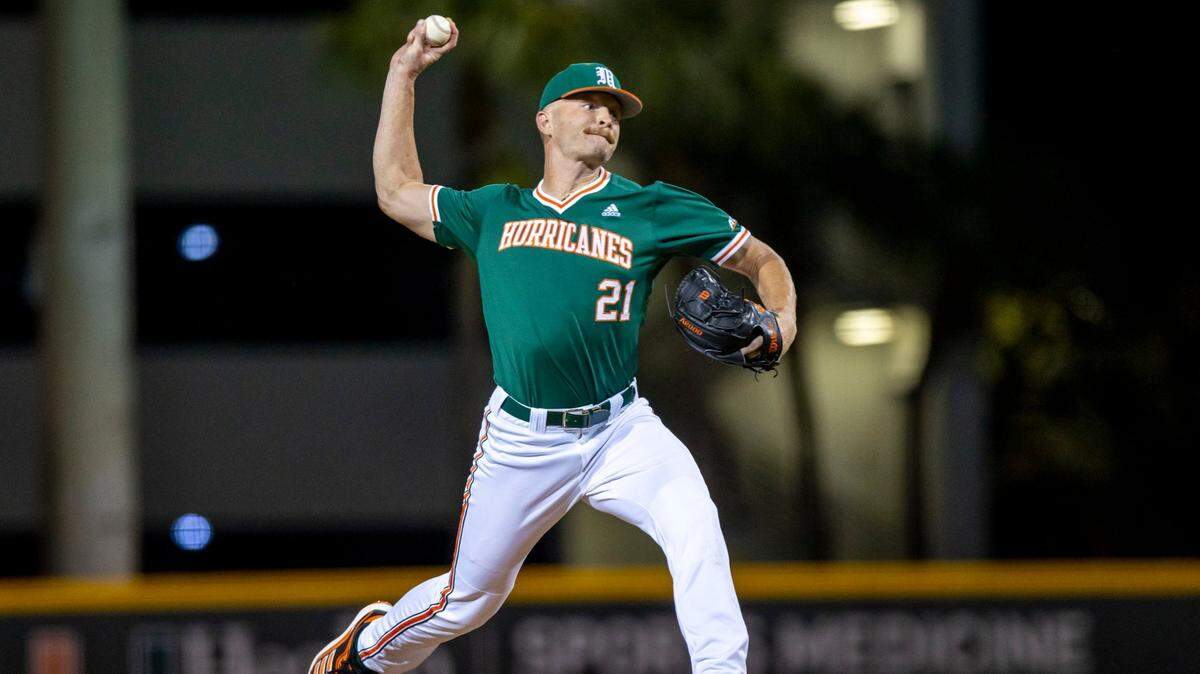 University of Miami pitcher Andrew Walters (21) throws a pitch during the ninth inning of an NCAA baseball game against University of Florida inside Alex Rodriguez Park at Mark Light Field in Coral Gables, Florida, on Friday, March 4, 2022. The Gators fell to the Hurricanes 5-2 dropping the first game of the three-game series.