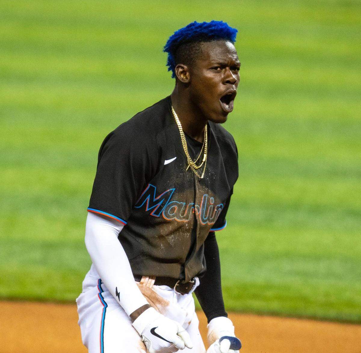 Miami Marlins Jazz Chisholm Jr.&nbsp;(2) reacts after tripling  to setup the Marlins for the lead during the seventh inning of an MLB game against the Tampa Bay Rays at loanDepot park in the Little Havana neighborhood of Miami, Florida, on Friday, April 2, 2021. 