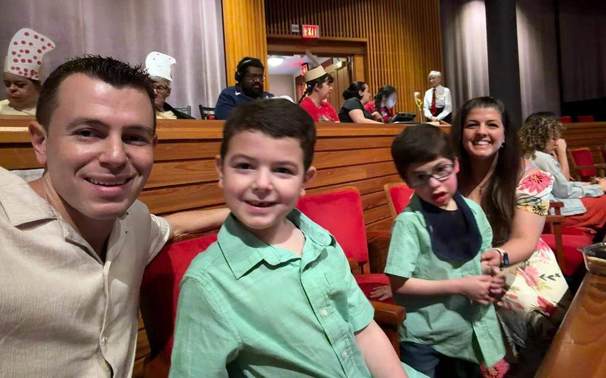 The Kores family sits for a performance of ‘Seussical the Musical’ at the Broward Center for the Performing Arts in Fort Lauderdale on Dec. 6, 2025.
