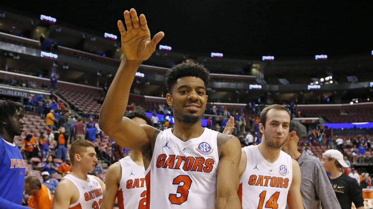 Florida Gators guard Jalen Hudson (3) does the Gator Chomp after the Gators defeat Florida Gulf Coast Eagles at the Orange Bowl Basketball Classic in the BB&T Center in Sunrise on Saturday, December 22, 2018.
