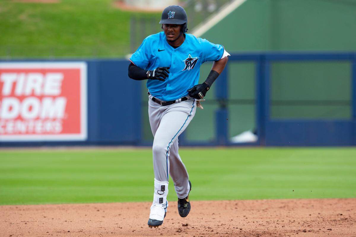 Miami Marlins Jerar Encarnacion (89) runs the bases after homering to center field during the ninth inning of a Spring Training game against the Houston Astros at FITTEAM Ballpark of the Palm Beaches in West Palm Beach, Florida on Tuesday, February 25, 2020.