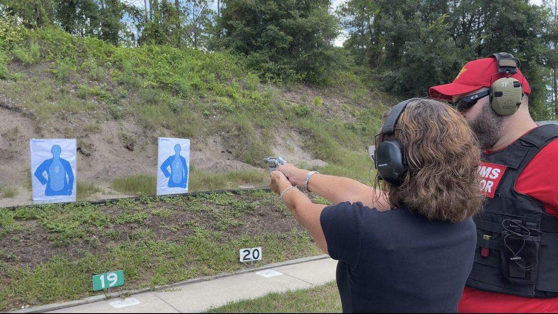 Sherryl Aten, of DeLand, an insurance agent, fires her .38 Special Smith & Wesson revolver after taking a gun safety class on July 22. The firearms safety course is the first free class given by the Volusia County Sheriff’s Office since a Florida law allowing the carrying of guns without a permit went into effect on July 1. Sheriff Mike Chitwood said the free class was prompted after 12 people have accidentally shot themselves since January.