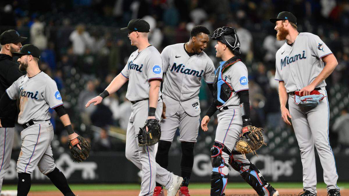 Jun 14, 2023; Seattle, Washington, USA; The Miami Marlins celebrate defeating the Seattle Mariners at T-Mobile Park. Mandatory Credit: Steven Bisig-USA TODAY Sports