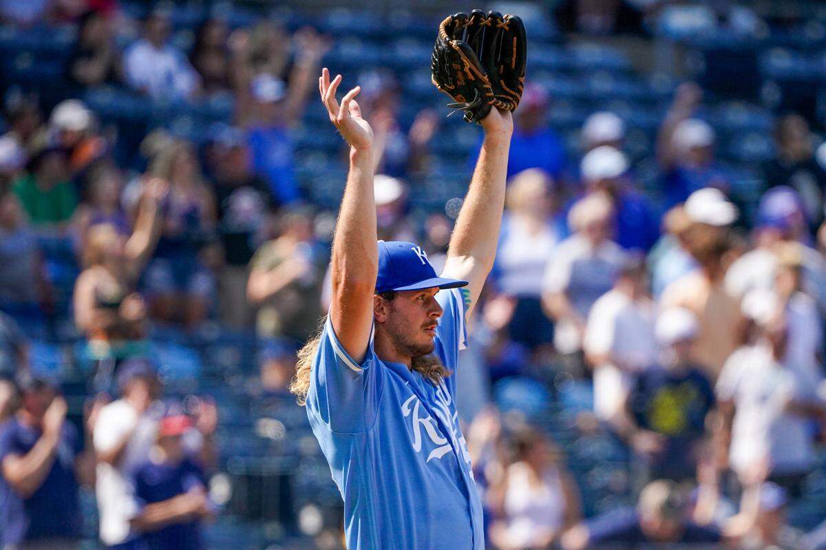 Kansas City Royals relief pitcher Scott Barlow (58) celebrates against the Tampa Bay Rays as the last out was made in the ninth inning at Kauffman Stadium.
