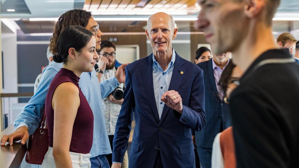 Florida U.S. Sen. Rick Scott greets attendees as he arrives for the Floridians Against Anti-Semitism roundtable event at Florida International University, in Miami, on Friday September 20, 2024.