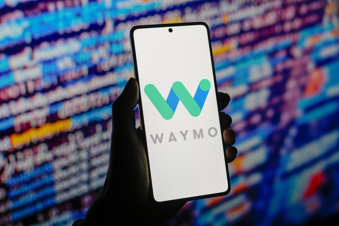 In this photo illustration, the Waymo logo is displayed on a smartphone screen. (Photo by Jaque Silva / SOPA Images/Sipa USA) *** Strictly for editorial news purposes only ***
