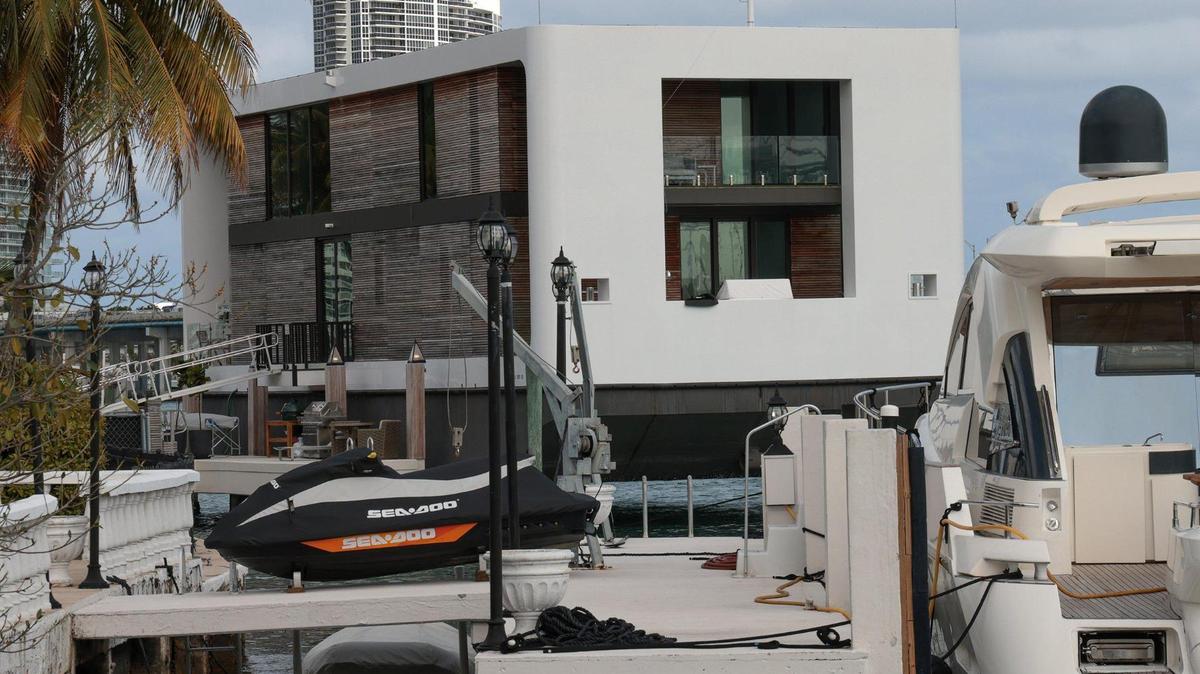 The owner of the Arkup #1 is suing the Miami-Dade property appraiser’s office over its decision to levy property taxes on the houseboat. The Arkup is shown docked at Star Island in March.