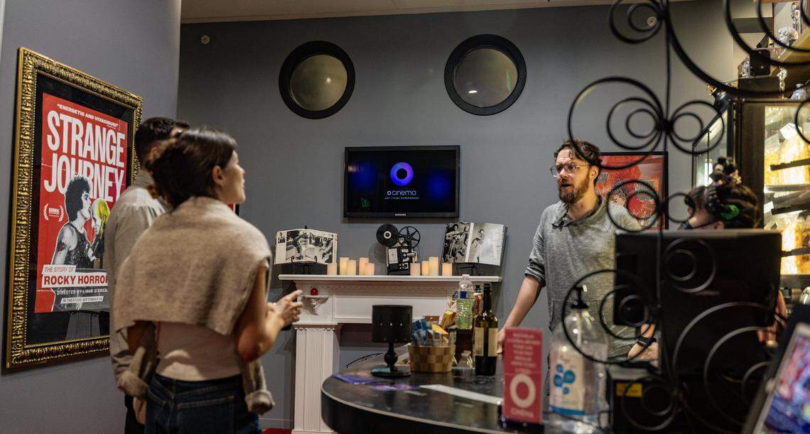 Matt Walter (right), welcomes patrons to the O Cinema, the independent, non-profit movie theater, located inside the former City of Miami Beach Historic City Hall on Washington Avenue and 12th Street, on Friday October 03, 2025.