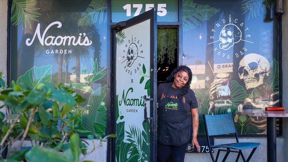 Naomi's Garden cook Keisha Scott stands at the entrance of the its new Miami Beach location on Tuesday, January 27, 2026.