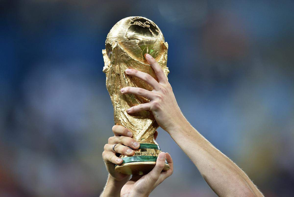 Players from Germany hold aloft the world’s most coveted sport trophy after winning the 2014 World Cup. The 2026 World Cup is being hosted by U.S., Mexico and Canada, and Miami is expected to be among the host cities.