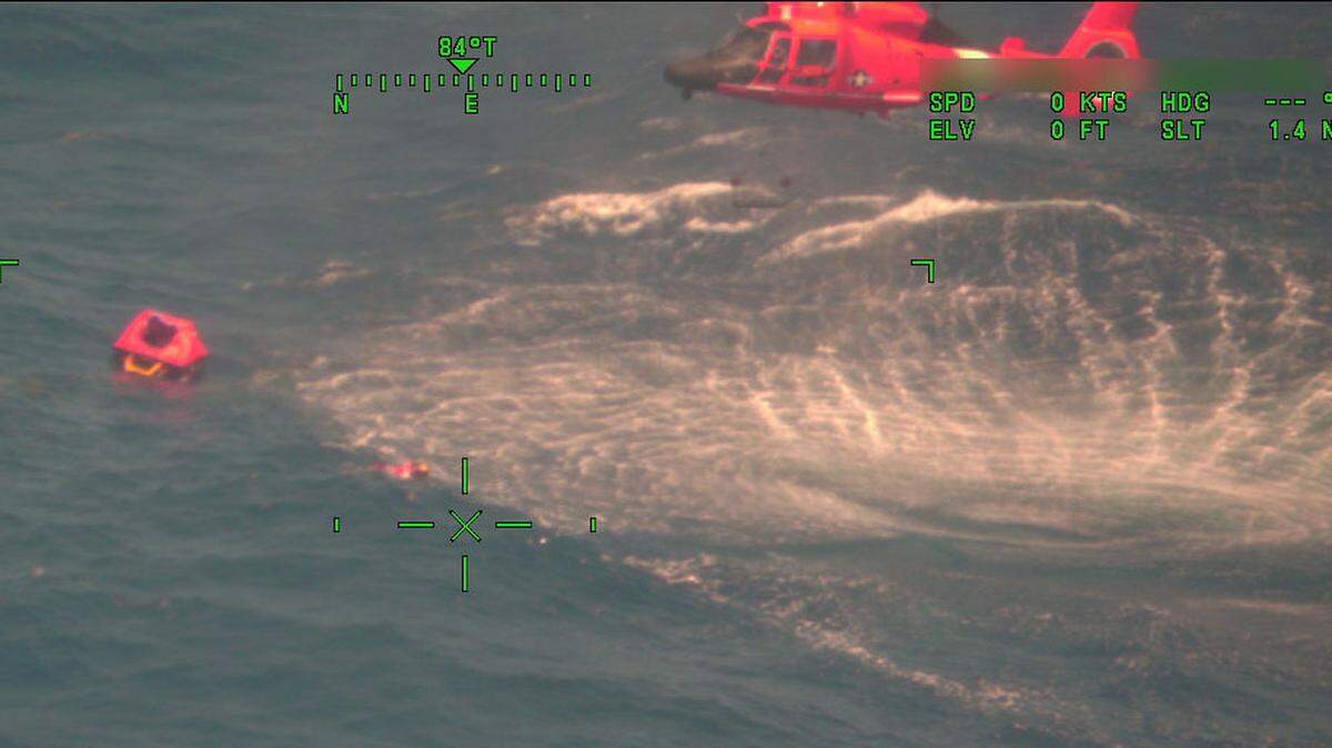 A Miami-based U.S. Coast Guard air crew rescued three men from a sunken vessel off the Dry Tortugas National Park on April 30, 2023.