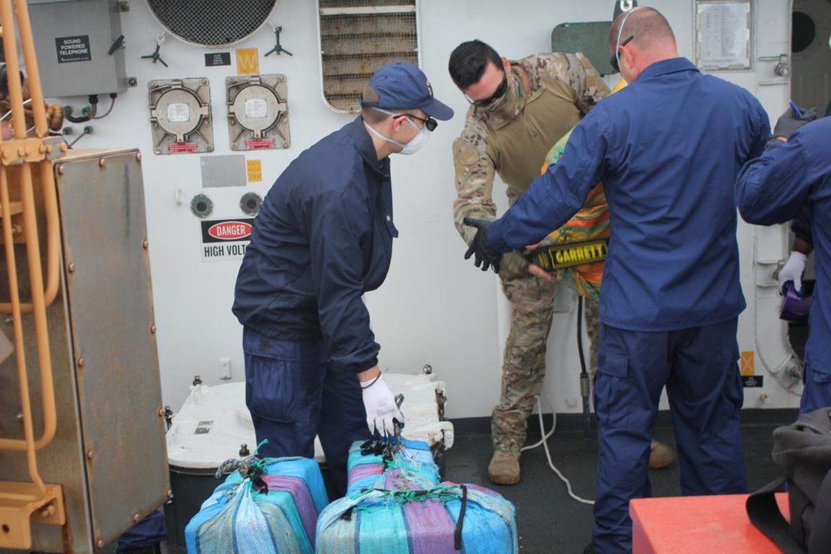 Coast Guard Cutter Mohawk crewmembers onload interdicted narcotics in the Easter Pacific Ocean, Monday, May 6, 2019.