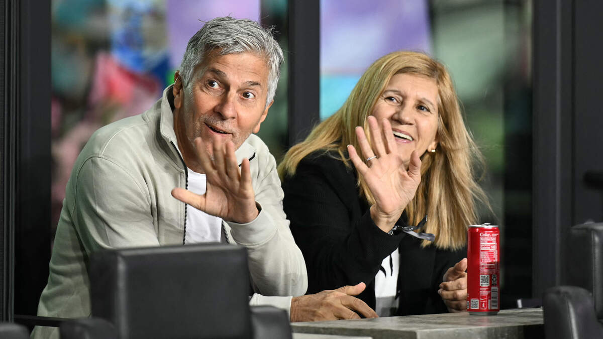 Jorge Messi (L) and Celia Cuccittini, parents of Inter Miami's Argentine forward Lionel Messi, wave as they prepare to watch the Major League Soccer (MLS) Eastern Conference final football match between Inter Miami and New York City FC at Chase Stadium in Fort Lauderdale, Florida on November 29, 2025. (Photo by Chandan Khanna / AFP via Getty Images)