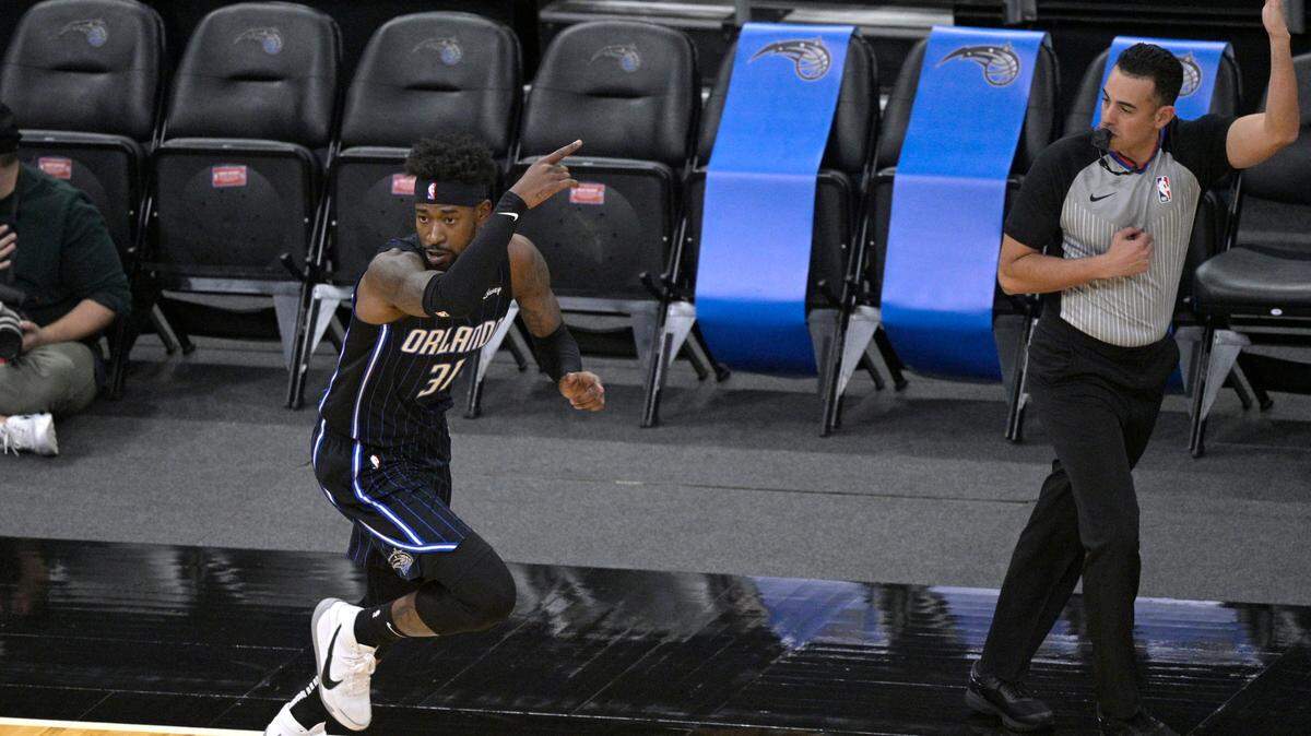 Orlando Magic guard Terrence Ross (31) celebrates after scoring a 3-point basket during the first half of an NBA basketball game against the Atlanta Hawks, Wednesday, March 3, 2021, in Orlando, Fla.