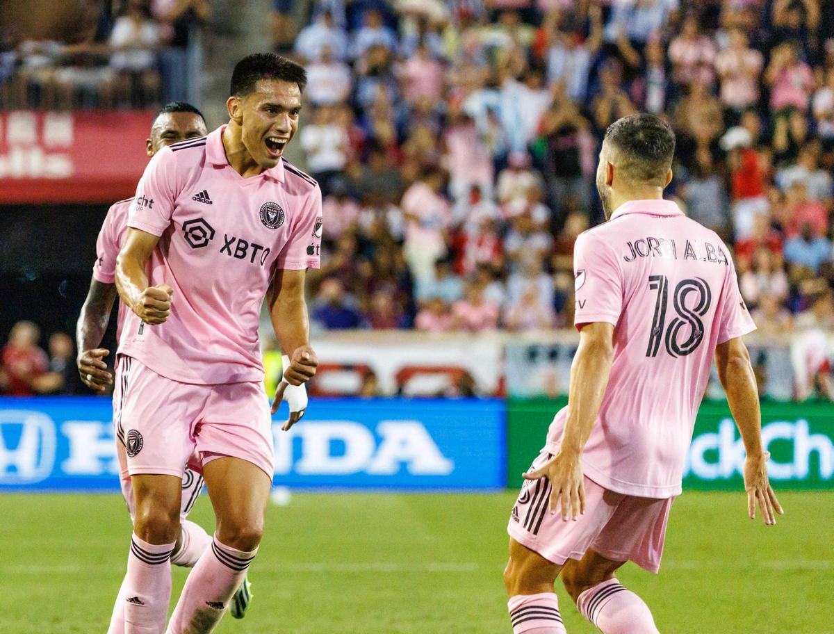 Inter Miami midfielder Diego Gomez (8) celebrates with teammates Jordi Alba (18) and Dixon Arroyo (3) after scoring a goal against New York Red Bulls during the first half of their MLS match at Red Bull Arena on Saturday, Aug. 26, 2023, in Harrison, N.J.