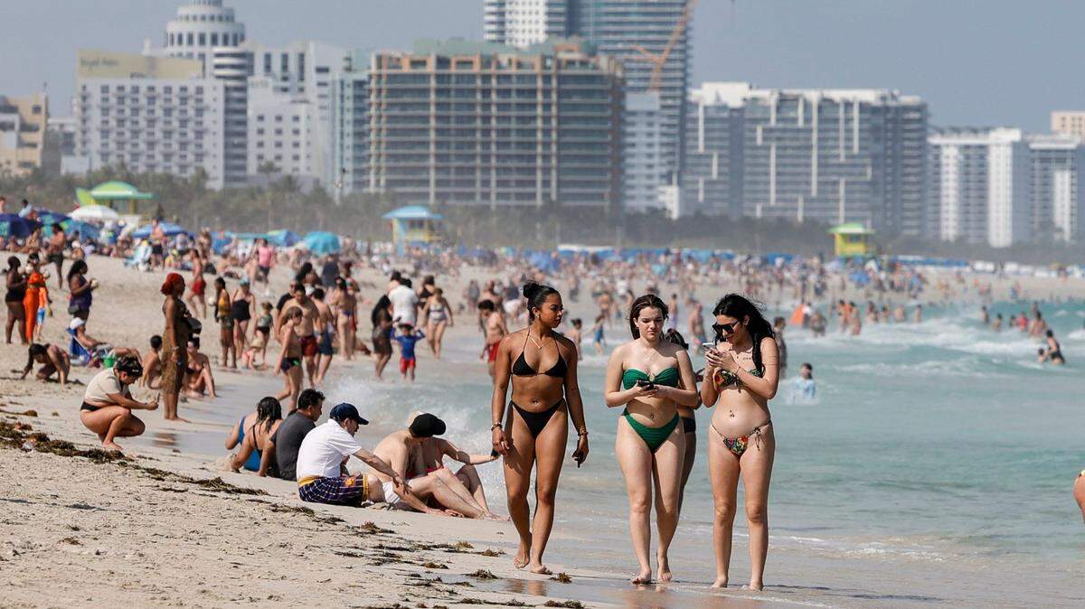 Beachgoers crowd South Beach during spring break on Miami Beach, Florida on Saturday, March 9, 2024.