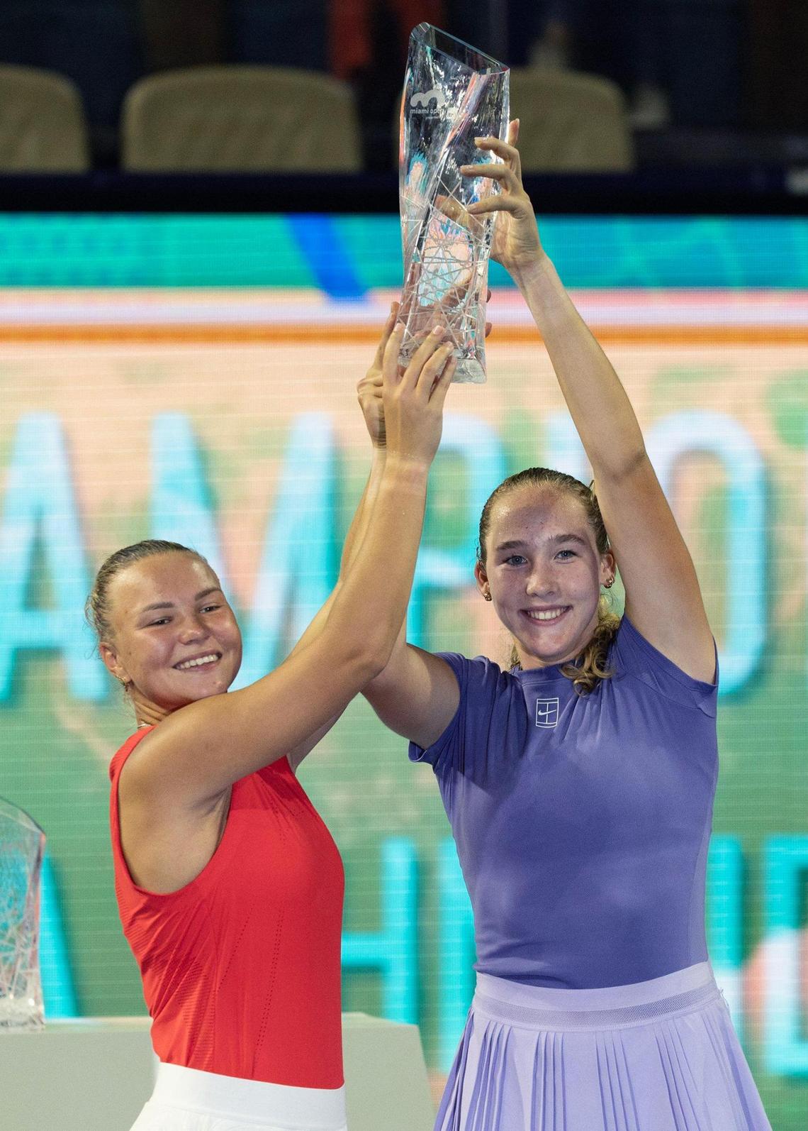 Diana Shnaider and Mirra Andreeva celebrate winning the Miami Open tennis women’s doubles match after defeating Cristina Bucsa, and Miyu Kato at Hard Rock Stadium in Miami Gardens, Florida, on Sunday, March 30, 2025.