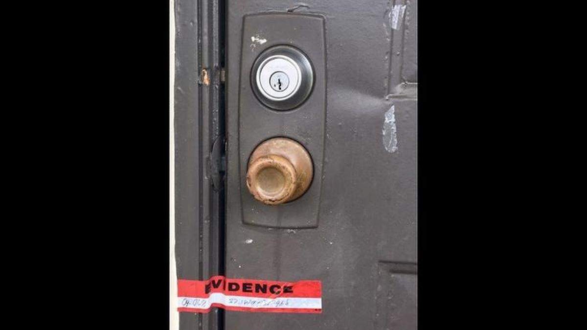 Firefighters had to remove the door to get inside a Margate apartment, where police found the bodies of a husband and wife Sunday afternoon. Each had a gunshot wound to the head, police said.