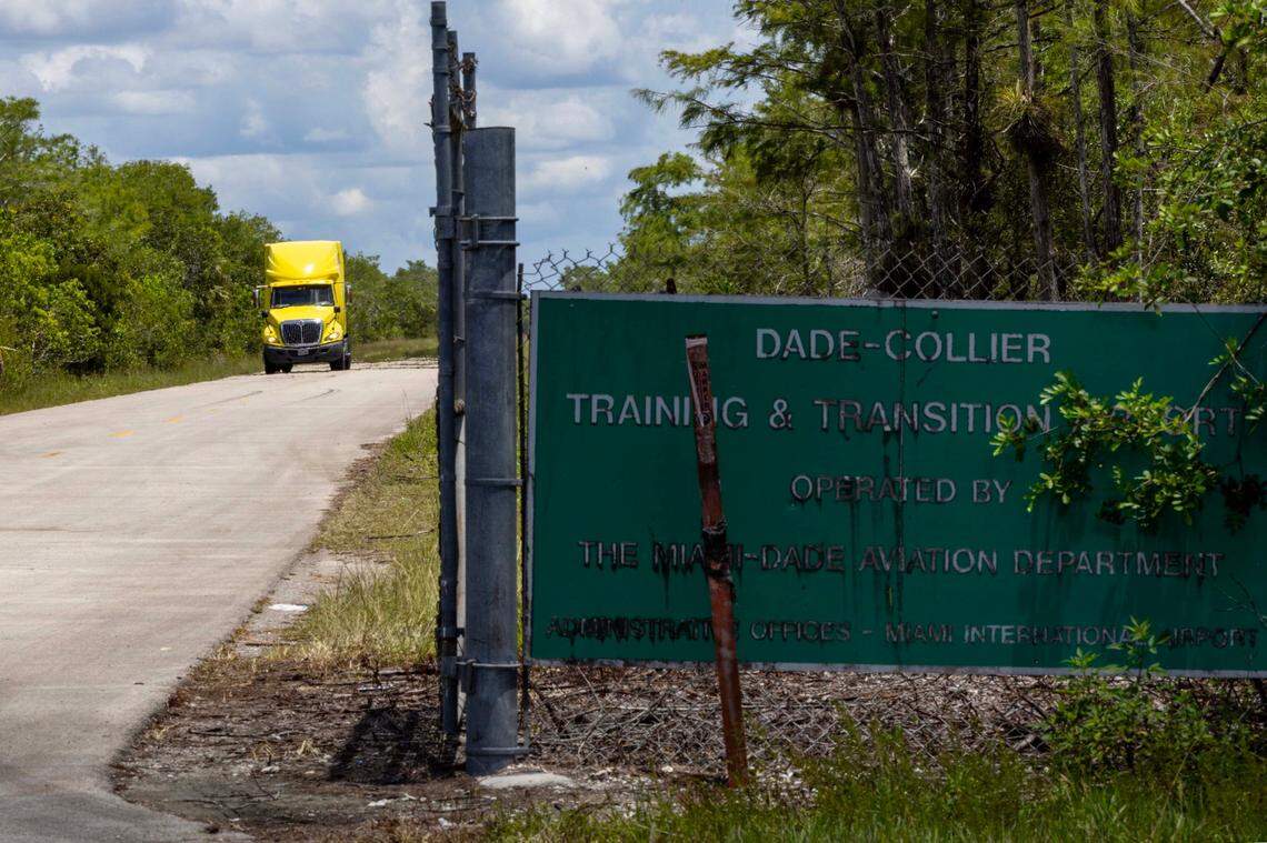 A truck drives out of the Dade-Collier Training and Transition Airport off Tamiami Trail on Monday, June 24, 2025, in Ochopee, Florida.