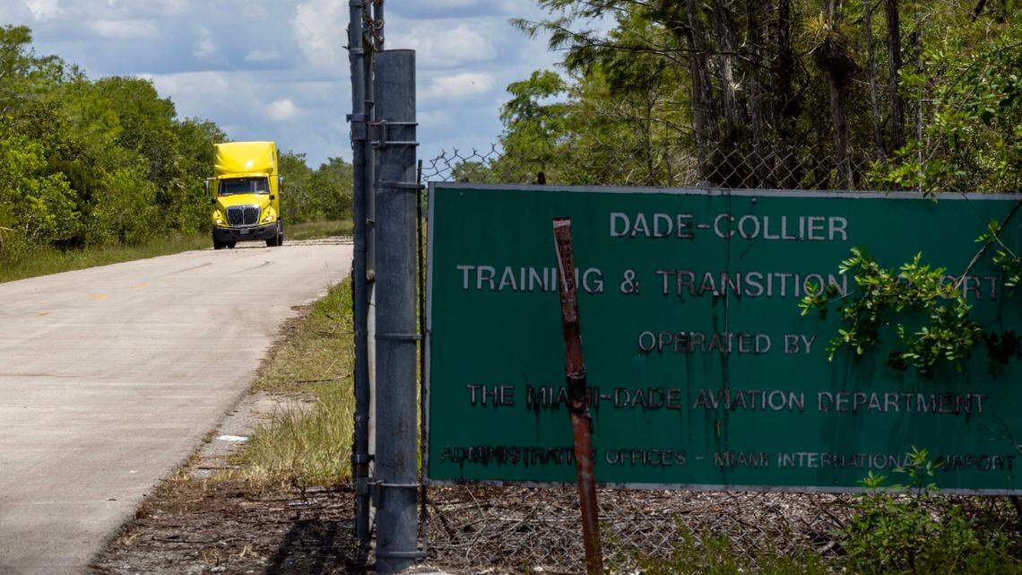 A truck drives out of Dade Collier Training and Transition Airport off Tamiami Trail on Monday, June 24, 2025, in Ochopee, Fla.