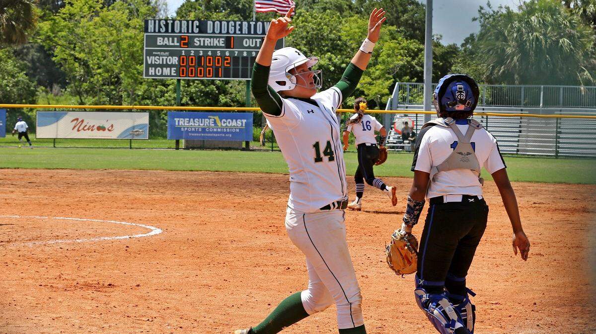 Westminster Christian Lindsey Arana crosses home plate to score in the fifth inning as her team plays Trinity Christian in the Class 4A Division on May 23, 2018. Westminster Christian went on to win the game and the Class 4A state softball title.