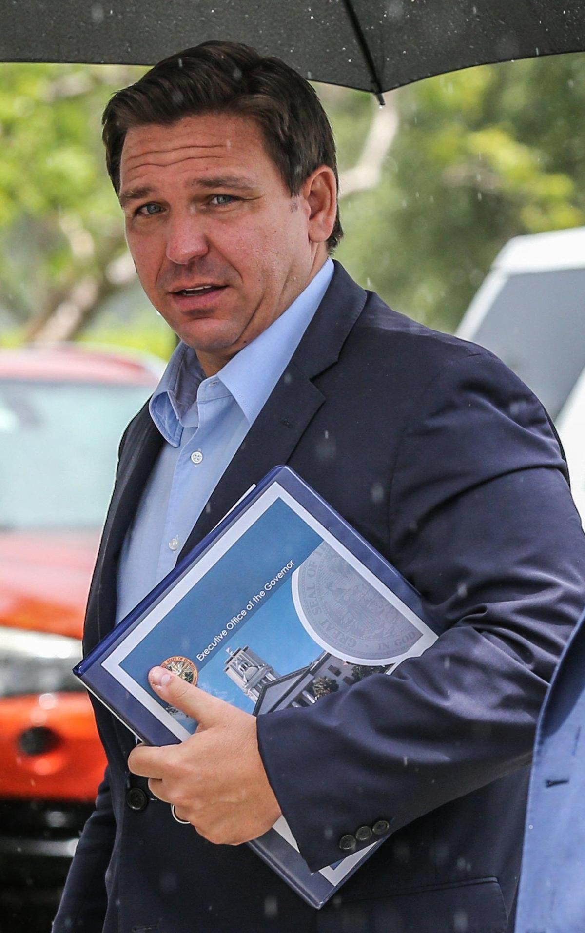 Florida Gov. Ron DeSantis arrives at the new Regeneron treatment site in Pembroke Pines at CB Smith Park on Wednesday, Aug. 18, 2021.