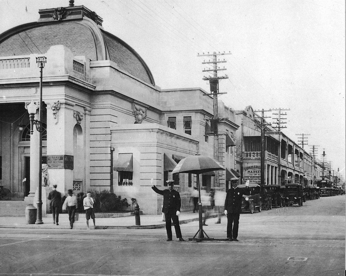 5/30/96--Photo Courtesy Miami Police Department Miami Police traffic unit at Miami Avenue and Flagler STreet, in the 1920s. In the background is the Bank of Bay Biscayne.