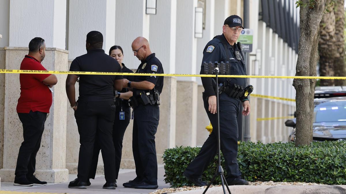 Coral Gables, Florida, June 6, 2024 - Police officers at the scene at Gables Ponce Apartments, 310 Granello Ave., where Miami Dade police say three people were shot in an apartment there, two fatally, in a murder suicide.