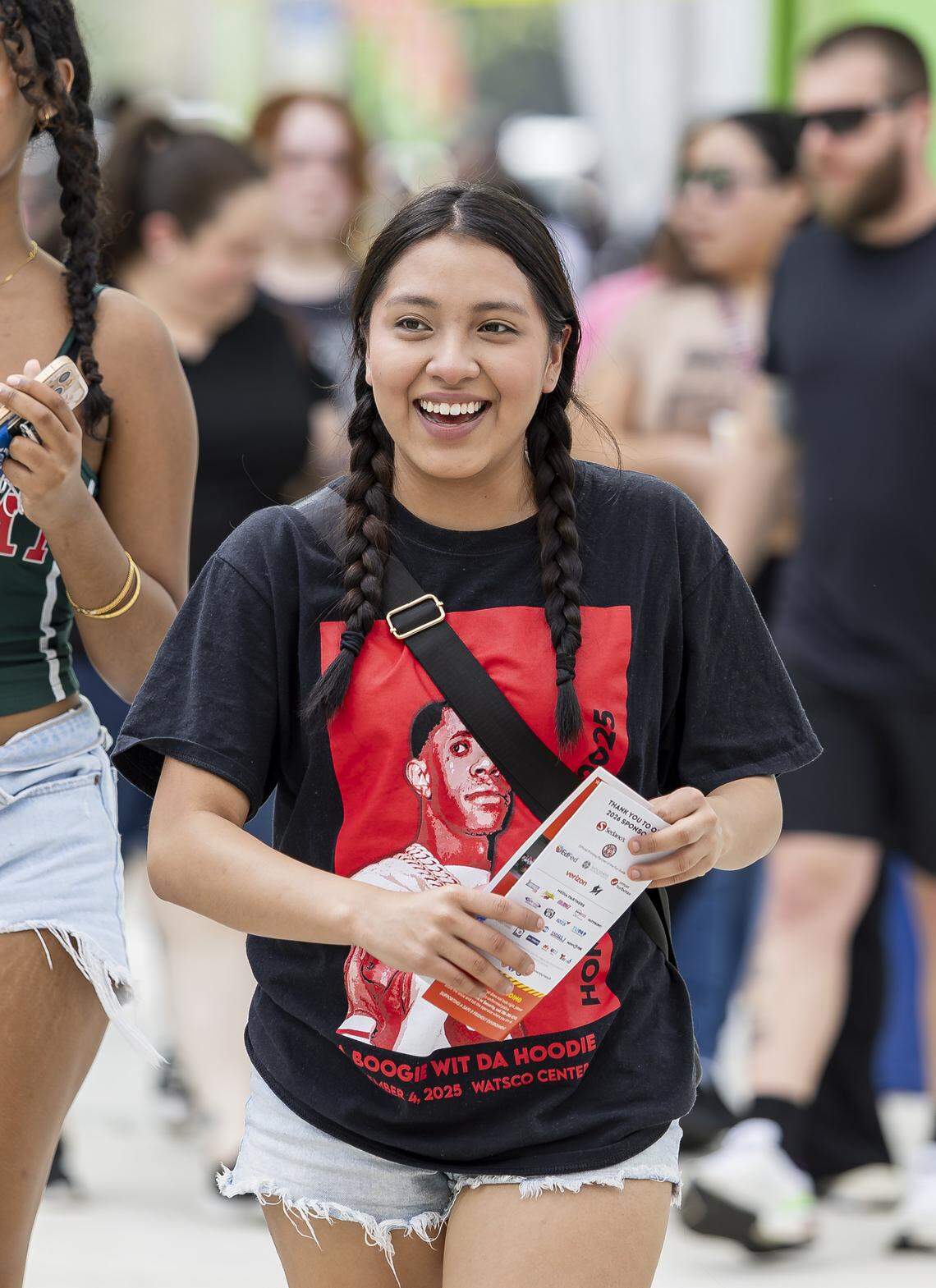 Mery Sanchez reacts as she arrives for the opening day of the 74th annual Miami-Dade County Youth Fair on Thursday, March 12, 2026, in Miami, Fla.