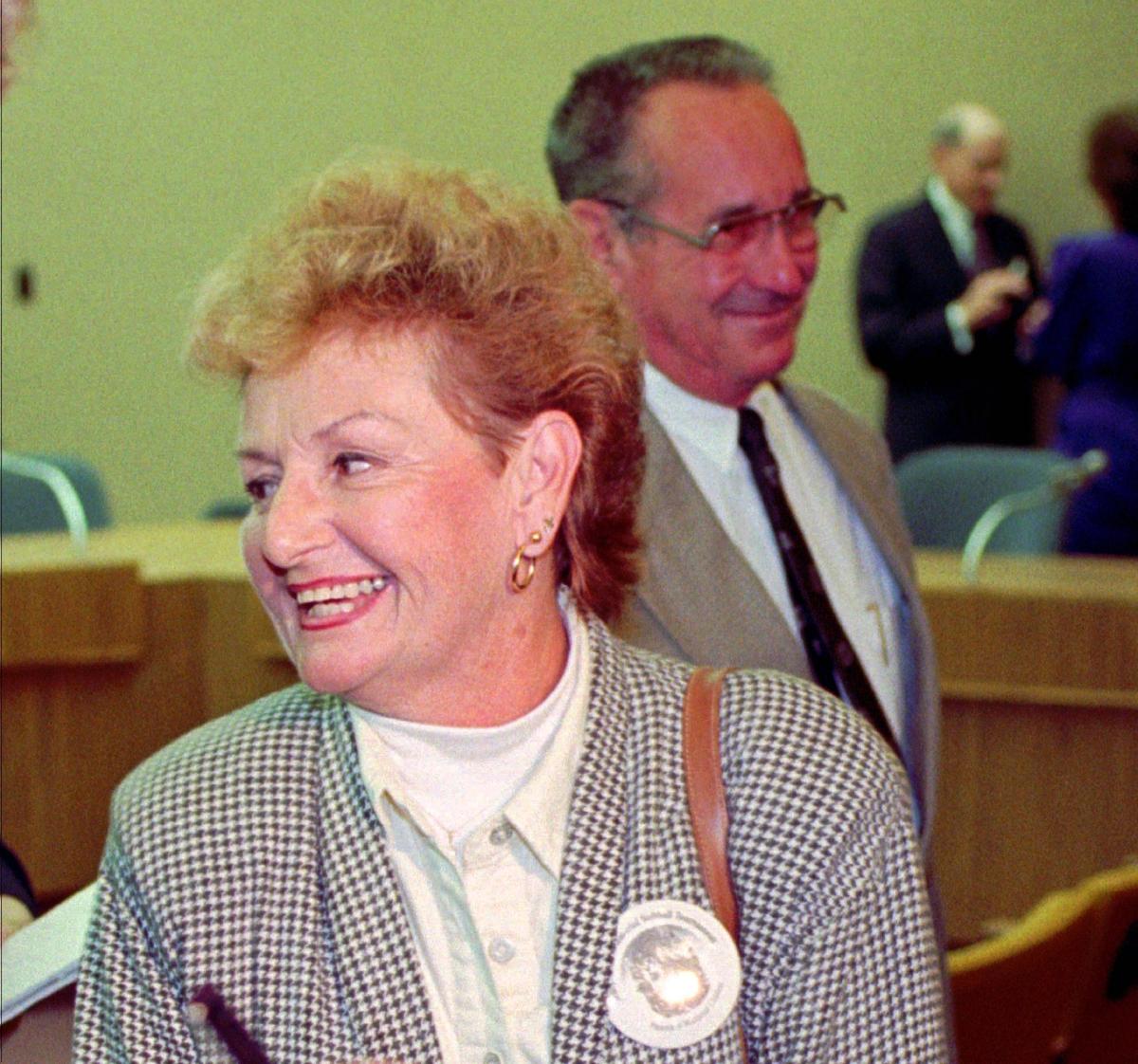 Ricky Paules, left and husband George Paules, parents of Tracy Paules killed by confessed killer Danny Rolling, are all smiles as the Senate Criminal Justice Committee breaks up after unanimously voting to confirm electrocution as Florida’s method of execution Tuesday, Feb. 17, 1998, in Tallahassee, Fla. The bill also names lethal injection as the next best execution method should the court ever rule electrocution as cruel and unusual punishment.