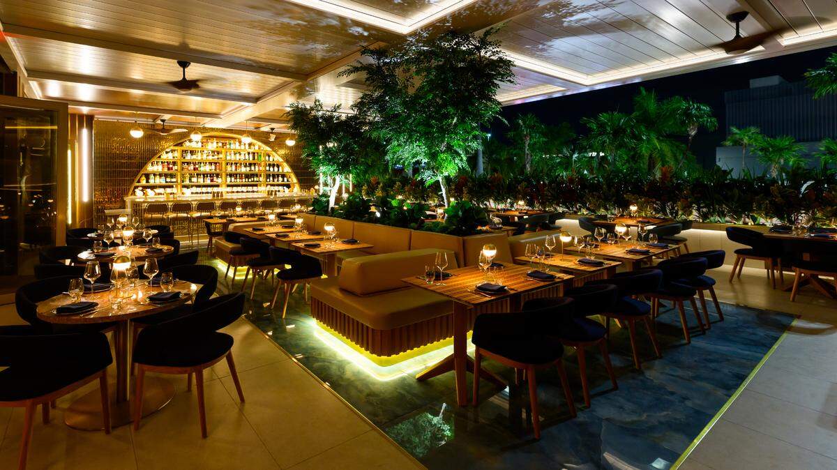 The outdoor dining area at Oro rooftop restaurant in Miami Beach.