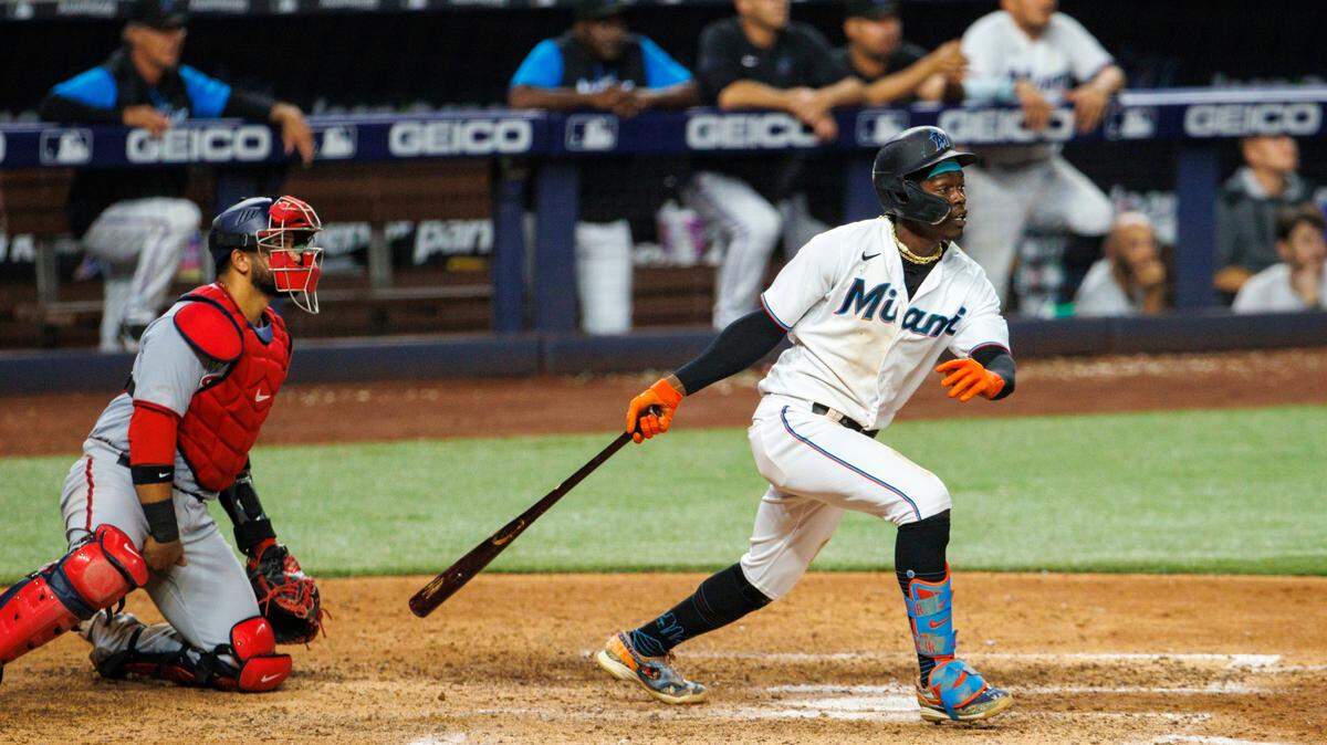 Miami Marlins second baseman Jazz Chisholm Jr. (2) sacrifice fly during the ninth inning of a baseball game against the Washington Nationals at LoanDepot Park on Wednesday, May 18, 2022 in Miami, Florida..