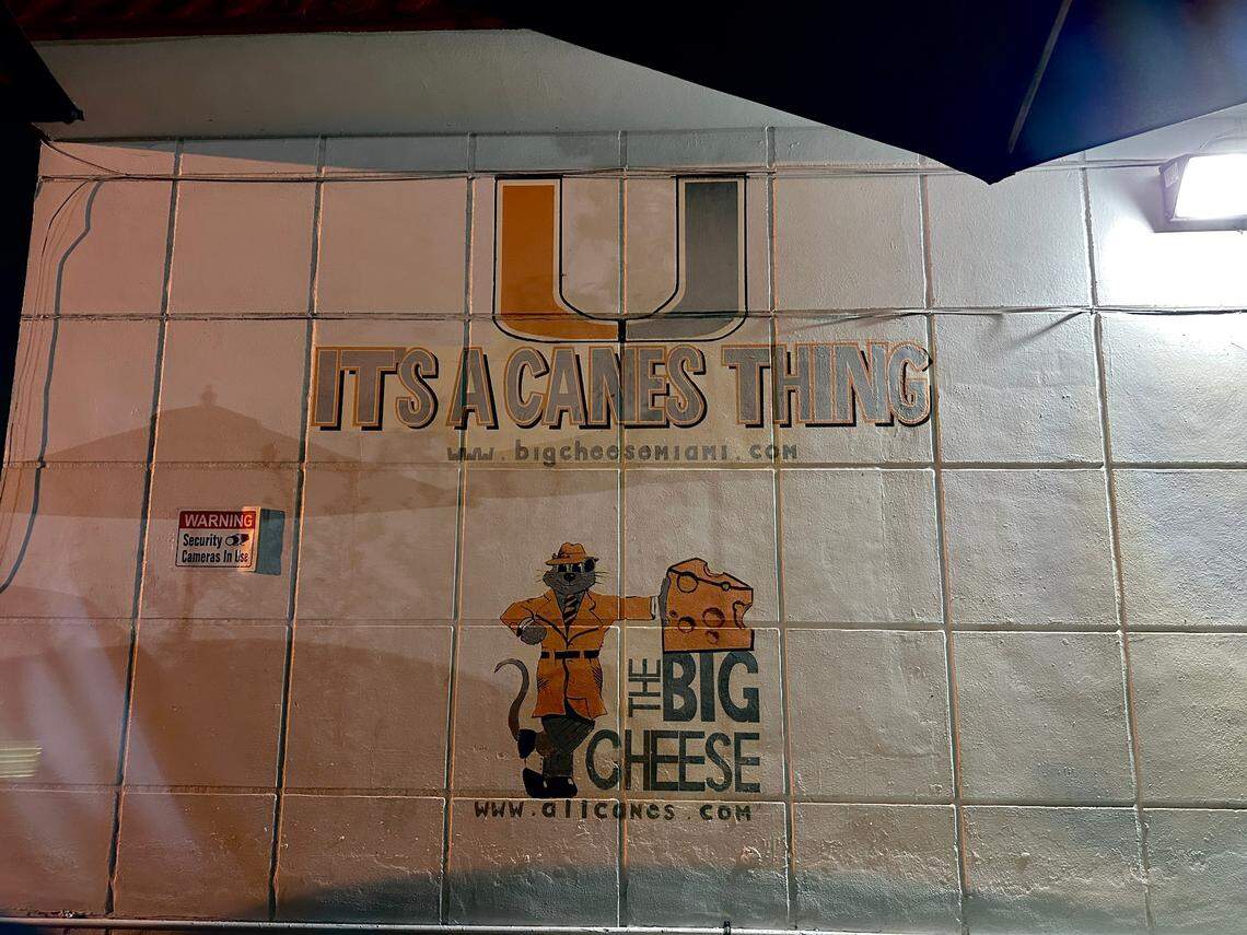 A side wall leading to the rear parking lot on the evening of March 5, 2025, reveals The Big Cheese’s love of the University of Miami. “It’s a Canes thing.”