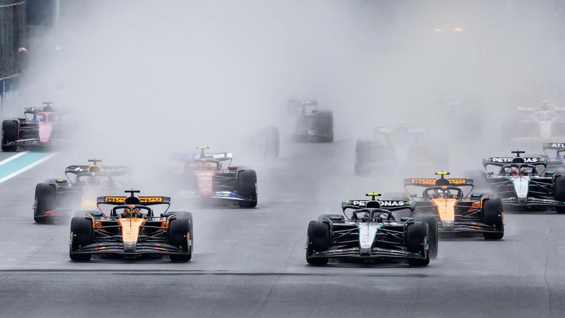 Spraying rainwater, the field led by Mercedes polesitter Kimi Antonelli on the right and McLaren’s Oscar Piastri on the left, accelerates during the start of the F1 Sprint race at the Miami International Autodrome on Saturday, May 3, 2025, the day before the Formula 1 Miami Grand Prix, in Miami Gardens, Fla.