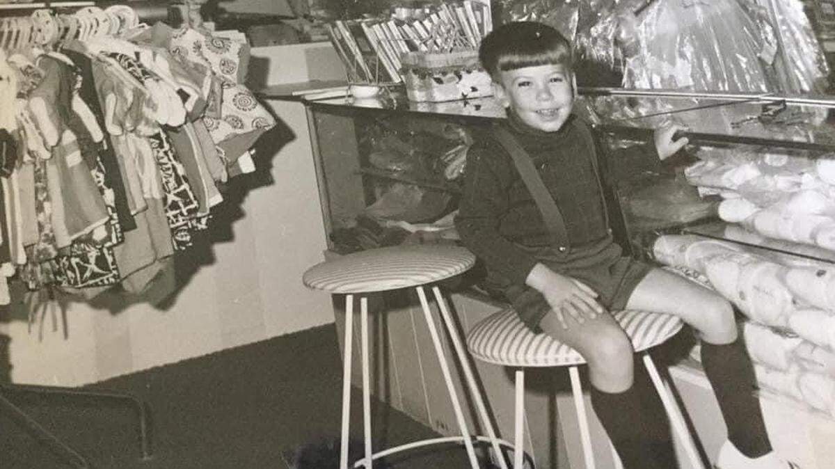 Jeff Kleinman modeling the latest 1960s fashions inside his parents’ children’s clothing store, Little Cherubs, at the Carillon Hotel.