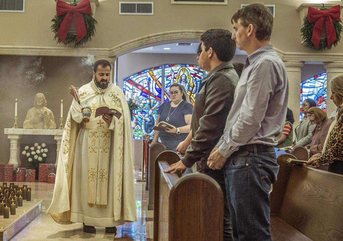 Father Manuel Rahmeh leads a Holy Mass for Venezuela at Our Lady of Lebanon Catholic Church, focused on prayers for prosperity, peace, and freedom, a day after the United States attacked Venezuela and captured leader Nicolás Maduro and his wife, Cilia Flores, on January 04, 2026.