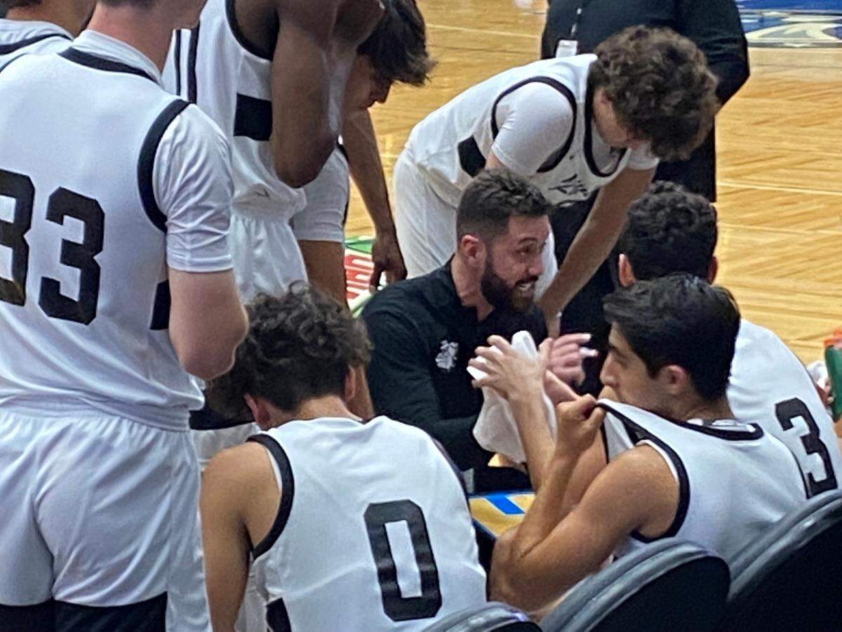 Riviera Prep boys’ basketball coach Anthony Shahbaz talks to his players during a timeout in Wednesday’s Class 3A state semifinal against Tampa Catholic at the RP Funding Center in Lakeland, Fla.