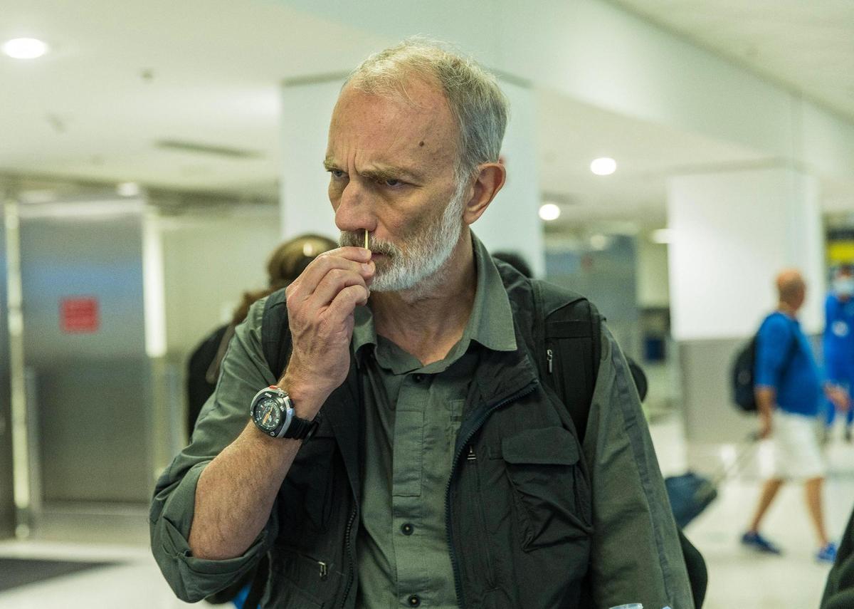 Traveler Bertrand Guenot arriving from the Bahamas on his way to Paris swabs his nose for a voluntary test as some travelers flying into Miami from other countries are being asked to do a nose swab to test for COVID variants and other contagious viruses as part of a nationwide effort to track new and emerging infectious diseases, on Thursday, March 14, 2024.