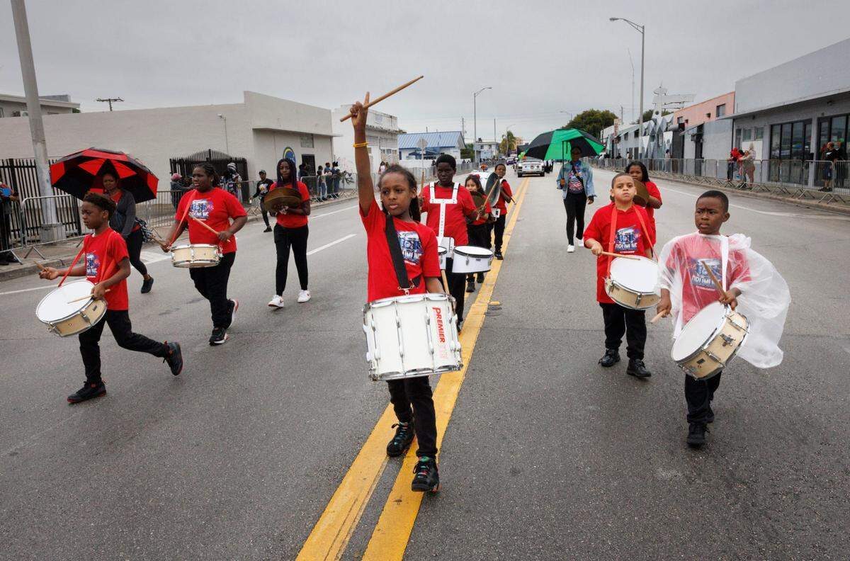 Tayori, center, leads the Agenoria S. Paschal / Olinda Elementary School band during the Dr. Martin Luther King Jr. Day parade on Monday, Jan. 20, 2025, in Liberty City in Miami, Fla.