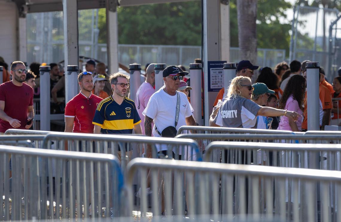 Fans make their way through security checkpoints ahead of the Group A first-round FIFA Club World Cup match at Hard Rock Stadium on Saturday, June 14, 2025, in Miami Gardens, Fla.