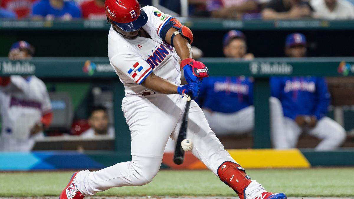 Dominican Republic infielder Jean Segura (2) hits a ground-rule double on a line drive to right-center field against Israel during the seventh inning of a Pool D game at the World Baseball Classic at loanDepot Park on Tuesday, March 14, 2023, in Miami, Fla.