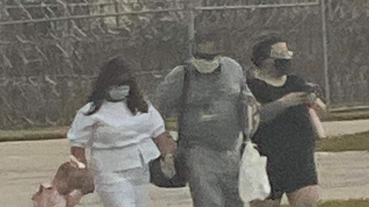 Raul Sosa Sr. is pictured with his family after he is released from the Federal Correctional Institution in South Miami-Dade on Thursday.