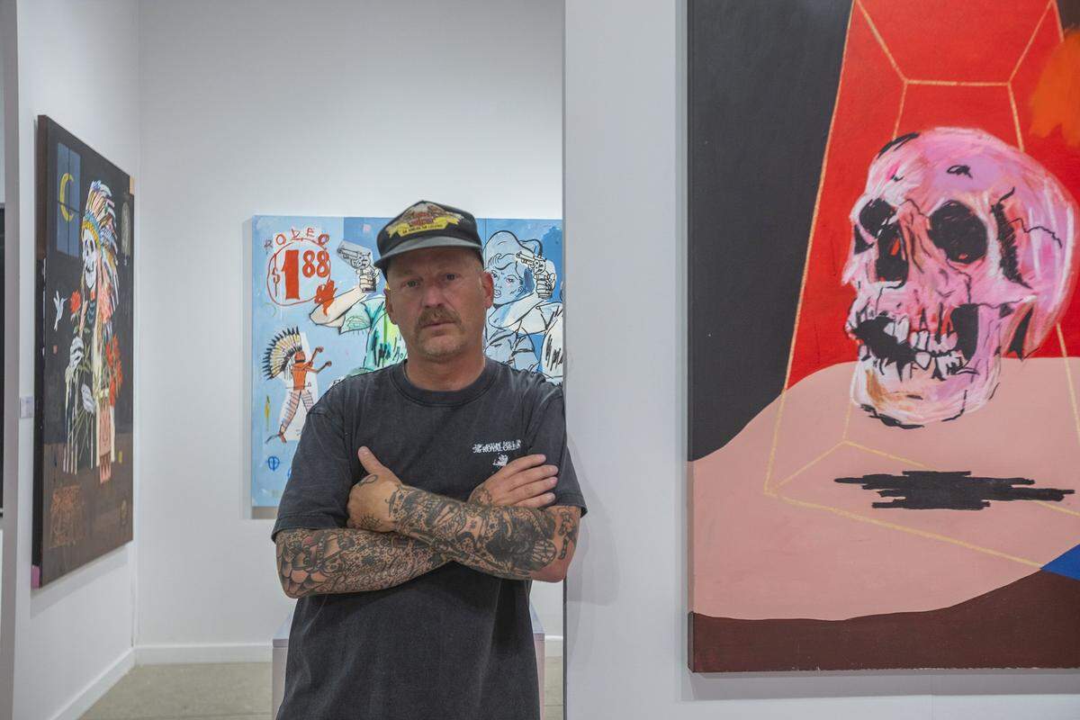 Terry Urban stands next to (R) "After Forever", 2025Acrylic, oil, pastel, and aerosol on canvas 48 × 36 in$9,000. Exhibited by West Chelsea Contemporary (WCC) at ART MIAMI in MIami on Tuesday December 2nd., 2025.