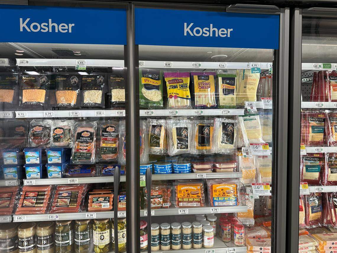 Two sections inside a cooler case are devoted to refrigerated Kosher products at the new Briar Bay Publix at 13005 SW 89th Pl. near The Falls.