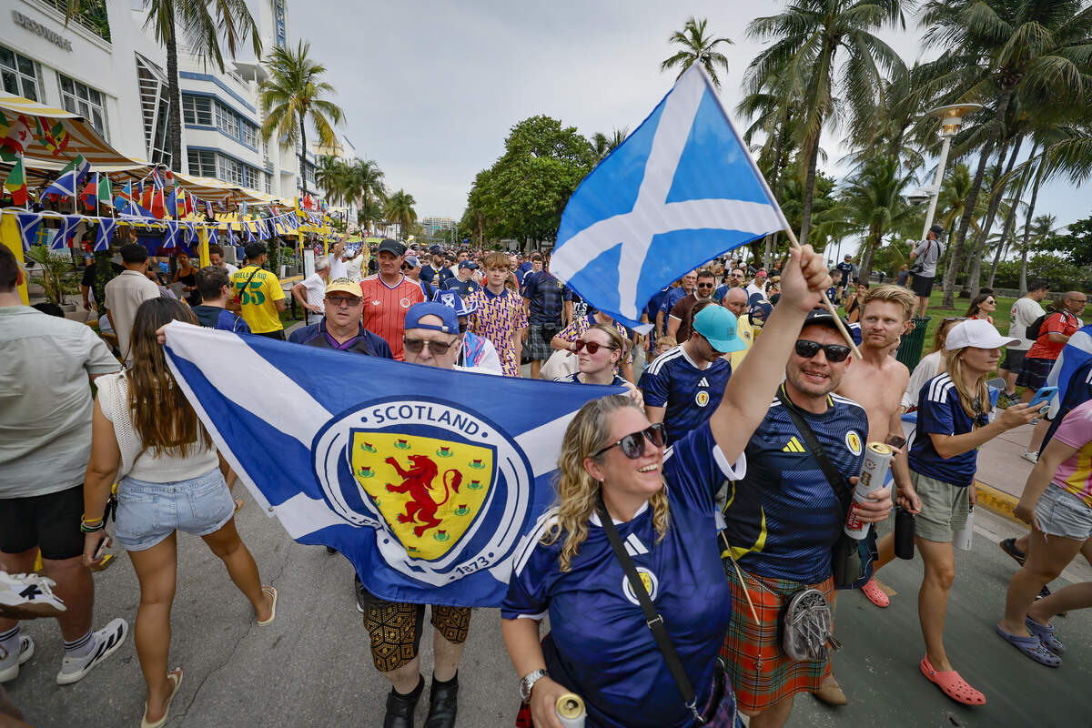 The Tartan Army, supporters of the Scotland national football team, parades along Ocean Drive on Miami Beach on Tuesday, June 23, 2026.