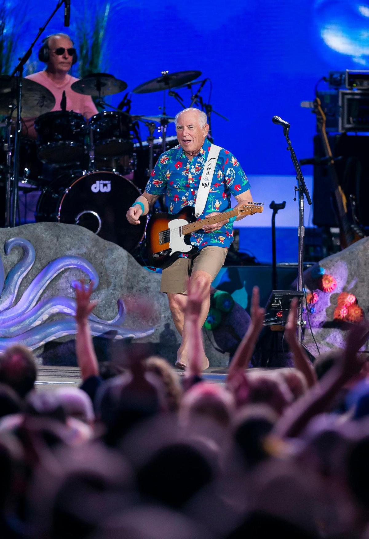 Jimmy Buffett and his Coral Reefer Band perform during their concert at the iTHINK Financial Amphitheatre in West Palm Beach, Florida on Thursday, December 9, 2021.