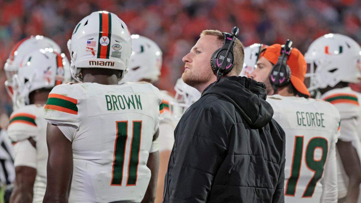 Miami Hurricanes quarterback Tyler Van Dyke (9) on the sidelines during the game against the Clemson Tigers at Frank Howard Field at Clemson Memorial Stadium in Clemson, South Carolina on Saturday, November 19, 2022.