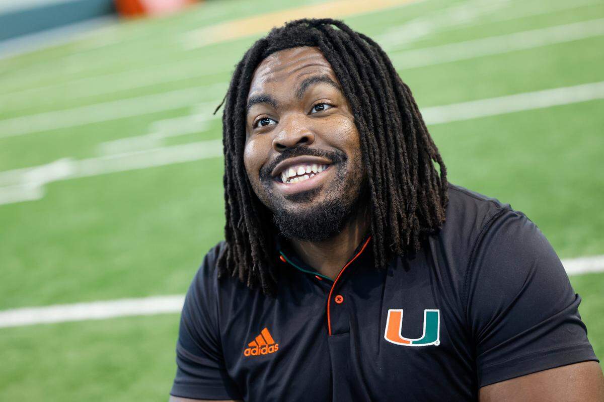 Miami Hurricanes defensive lineman Simeon Barrow Jr. speaks to reporters at the University of Miami’s Carol Soffer Indoor Practice Facility on Tuesday, July 30, 2024.
