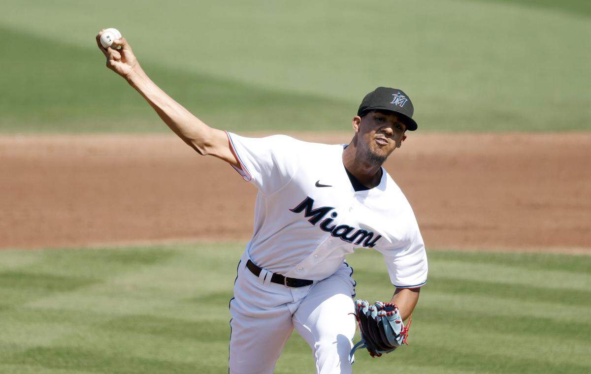 Miami Marlins pitcher Eury Perez (76) throws in the fourth inning against the St. Louis Cardinals at Roger Dean Stadium on Feb. 26, 2023, in Jupiter, Florida.