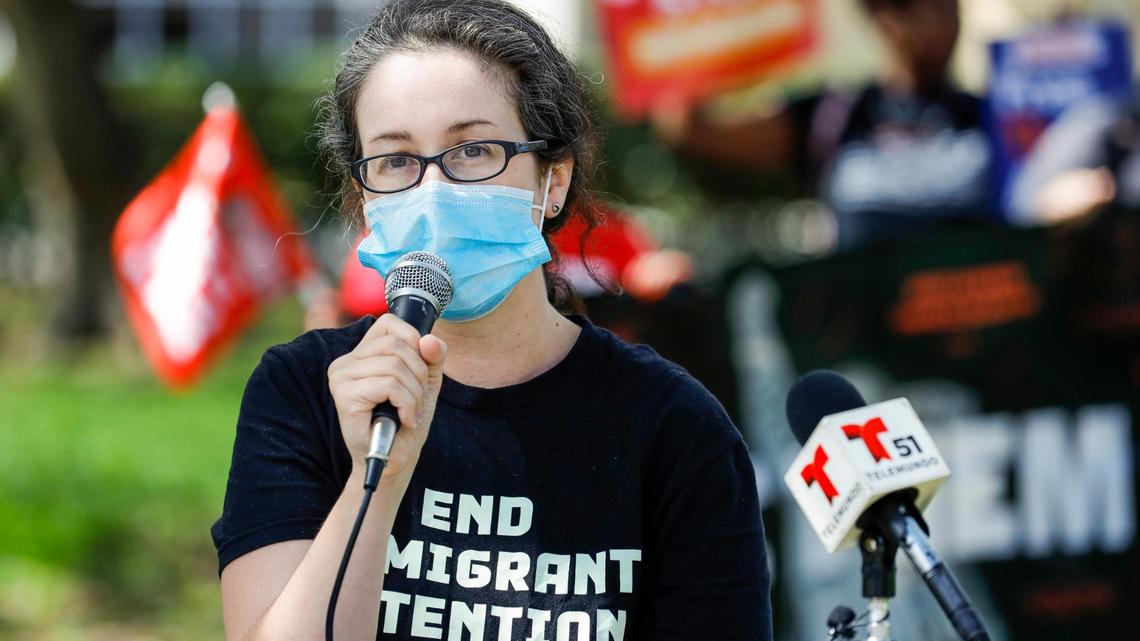 Rebecca Talbot, Glades Lead of the Immigrant Action Alliance, talks to reporters outside the ICE Field Office at 865 SW 78th Ave. demanding the closure of federal detention centers during a protest in Plantation, Florida, on Thursday, March 3, 2022.